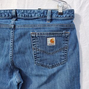 Carhartt Womens Size 12x34 Curvy Fit Blue Jeans WB014 VTB STAINED FRONT
